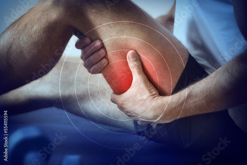 Representation of pain in the hamstrings in red on blue photo