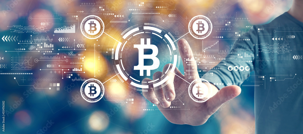 Bitcoin theme with man on blurred blue city light background