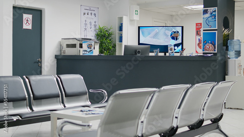 Картината върху платно Empty hospital waiting room in lobby with reception counter at medical facility, used to help patients with appointments and healthcare insurance
