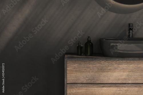 Close up of black sink with oval mirror standing in on dark wall , white cabinet with black faucet in minimalist bathroom. 3d rendering © leymandesign