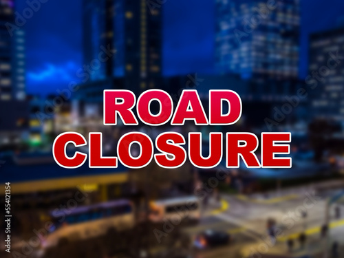 Blurred background of traffic with the words Road Closure in the foreground