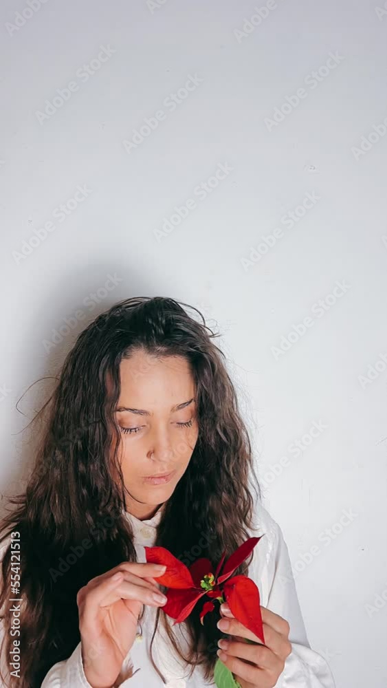 woman smelling a flower, flower, red flower, woman, beauty, hair, face, person, people, smile, smiling, fashion, model, eyes, brunette, one, studio, flower, red, happiness, teen, holding, color, heart woman smelling a flower, flower, red flower, woman, beauty, hair, face, person, people, smile, smiling, fashion, model, eyes, brunette, one, studio, flower, red, happiness, teen, holding, color, heart