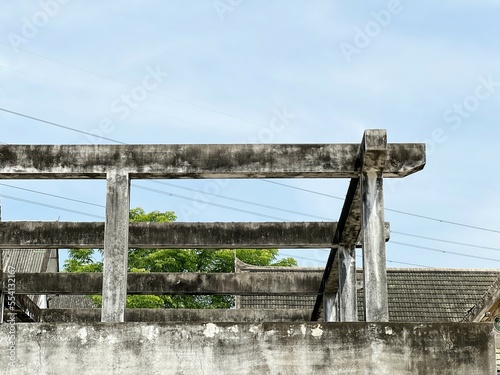 old cement building in the city photo