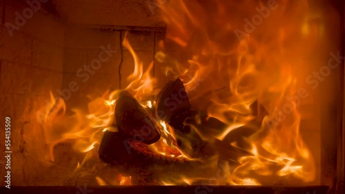 Burning fire in the fireplace photo