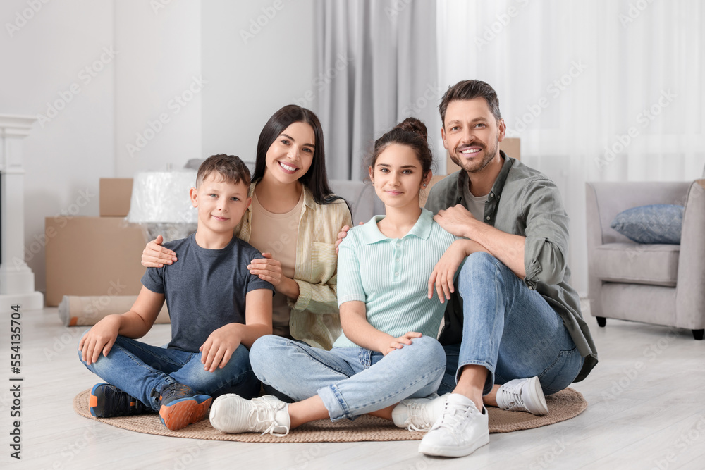 Happy family spending time in new apartment. Moving day Happy family spending time in new apartment. Moving day