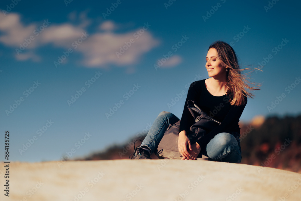 
Beautiful Woman Sitting and Relaxing on a Summer Trip
Happy girl traveling feeling mindful and optimistic

