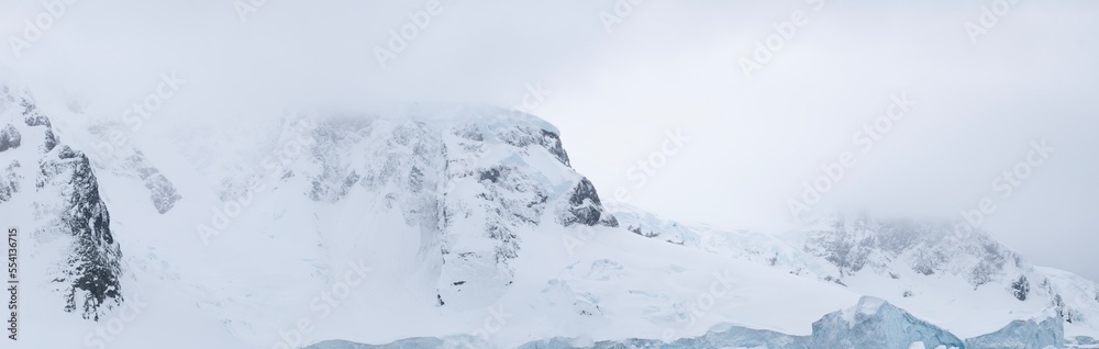 The jagged rock, icy layers, and snow create the terrain of Antarctica. The jagged rock, icy layers, and snow create the terrain of Antarctica.