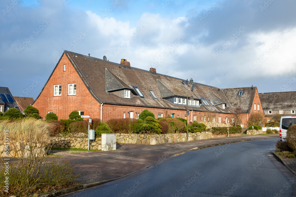 scenic old historic brick houses in List, a small village at the island of Sylt, Germany scenic old historic brick houses in List, a small village at the island of Sylt, Germany