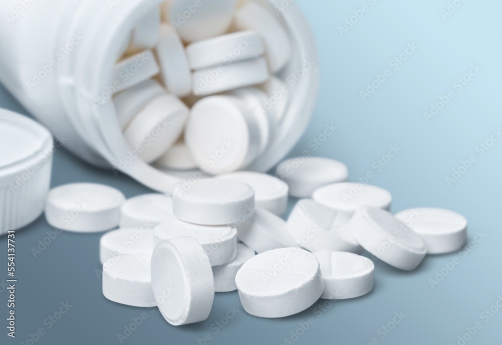 Supplements, pills, drugs on dark background. Supplements, pills, drugs on dark background.