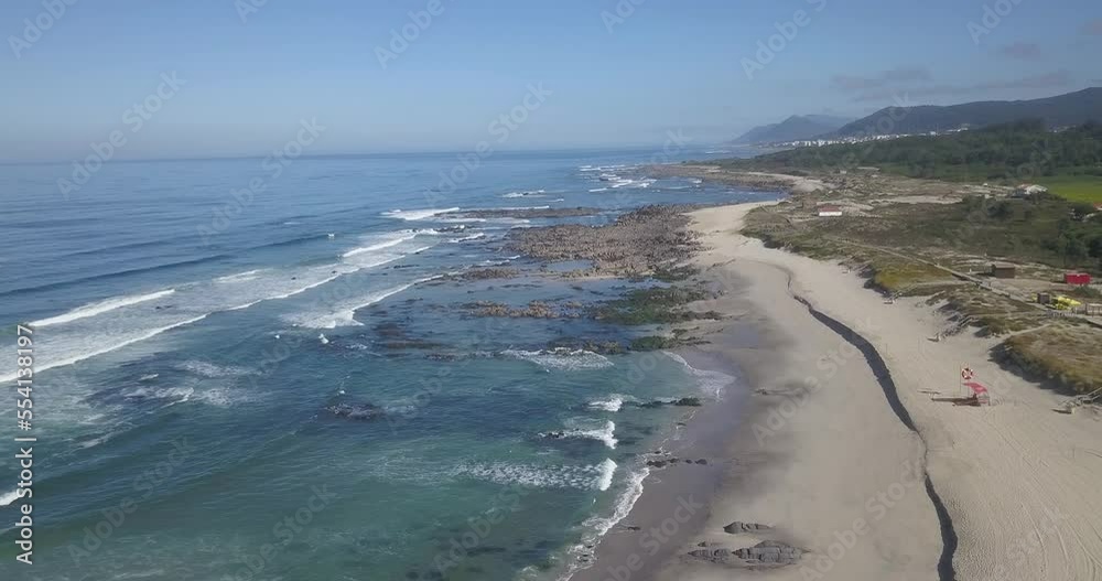 Aerial View Directly Above Gentle Ocean Waves Breaking onto Sand at Afife, Portugal Aerial View Directly Above Gentle Ocean Waves Breaking onto Sand at Afife, Portugal