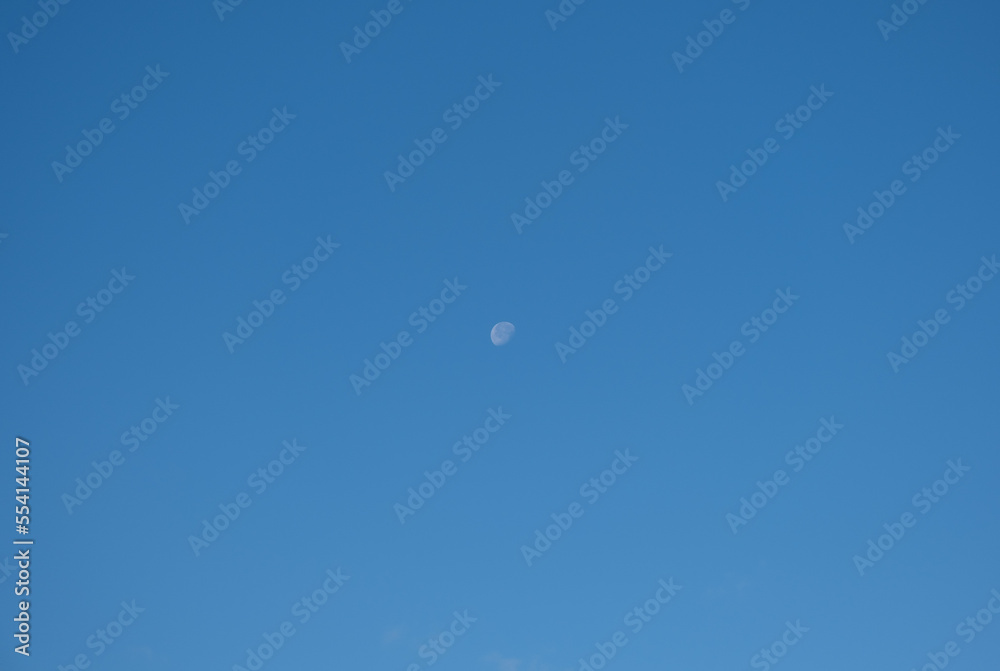 The moon in the clear blue daylight The moon in the clear blue daylight
