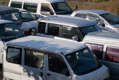 Many broken and abandoned cars collected at the repair shop © IEPPEI