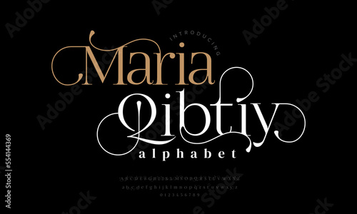 Mariaqibty abstract simple fashion wedding alphabet. Elegant ligature typography typeface design