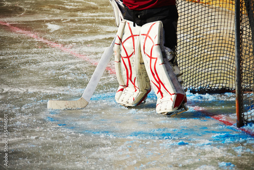 Photography Person in ice hockey outfit on the ice
