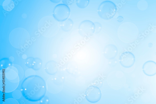 Abstract Beautiful Transparent Blue Soap Bubbles Background. Blurred White Bokeh, Defocus. Circles Bubbles. Freshness Soap Sud Bubbles 
