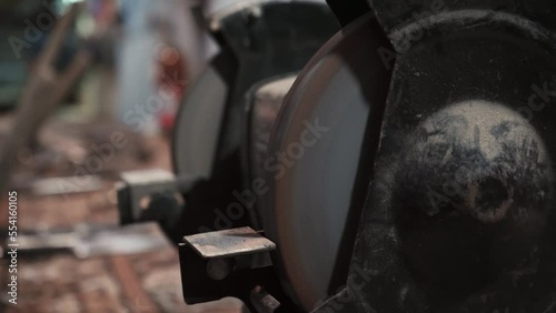 Sander emery close-up. Selective selective focus. Apparatus in the workshop for sharpening tools.