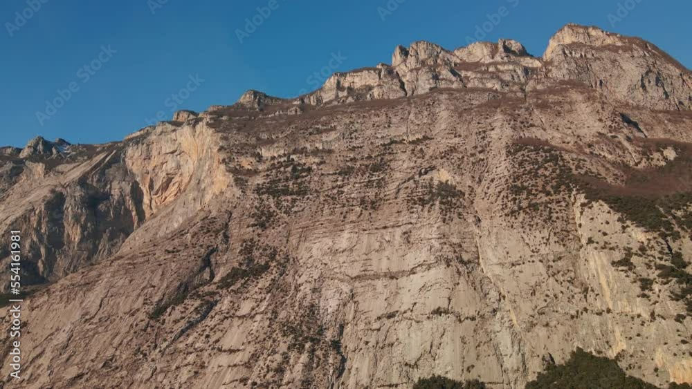 Majestic Mountain Landscape Against Blue Sky In The Province Of Trentino, Northeastern Italy. Low Angle Shot Majestic Mountain Landscape Against Blue Sky In The Province Of Trentino, Northeastern Italy. Low Angle Shot