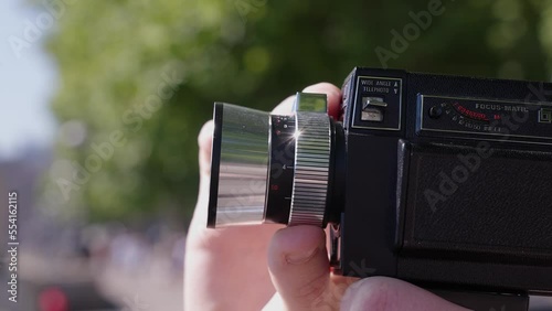Cinematic shot of traveller using camera in London photo