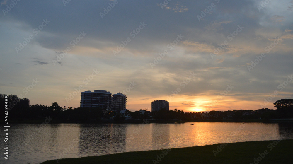 Sunset Over A Park Lake