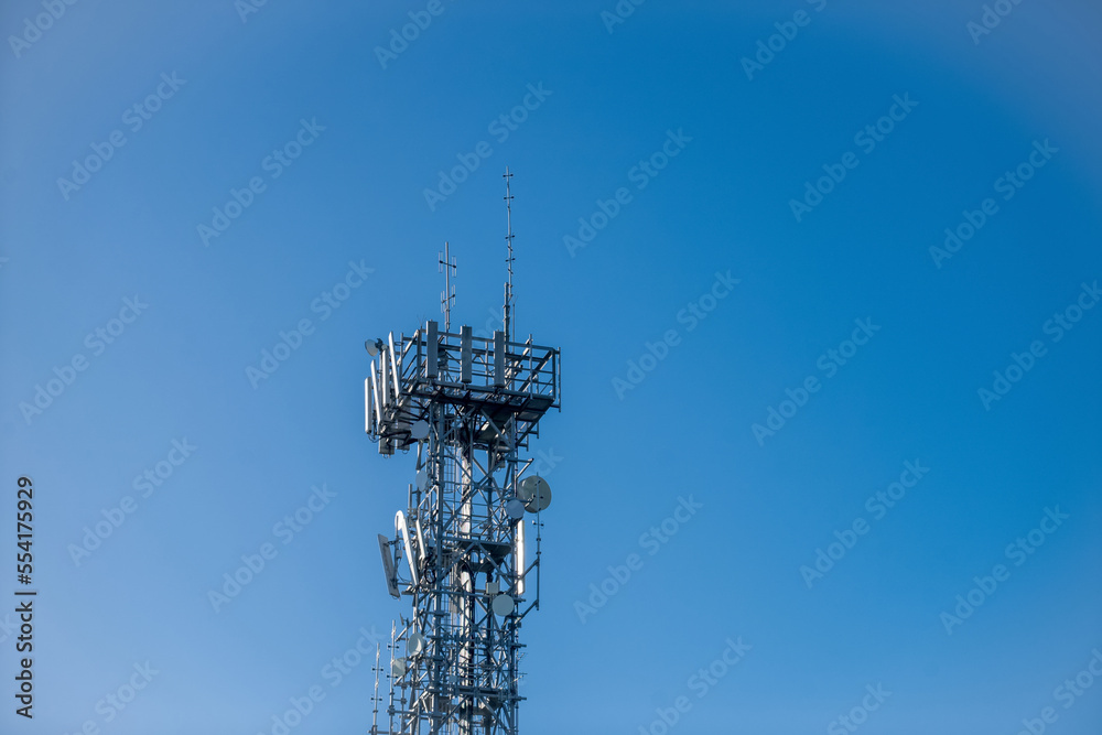 Radio, communication and cell tower on blue sky background. Australia Radio, communication and cell tower on blue sky background. Australia