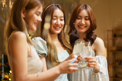 New Year party concept, Young beautiful group clinking champagne to celebrating with fun in party