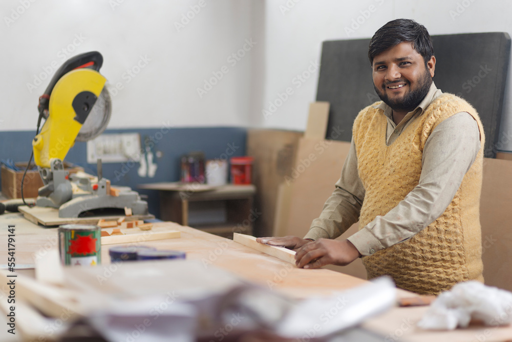 © IndiaPix - Young carpenter in his work shop © IndiaPix - Young carpenter in his work shop