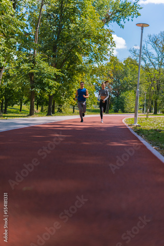 Wallpaper Mural Two adults running Torontodigital.ca