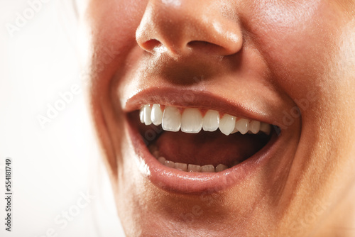 Close up of agirls mouth smiling