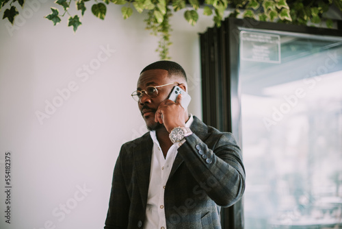 Close up of business man talking on the phone
