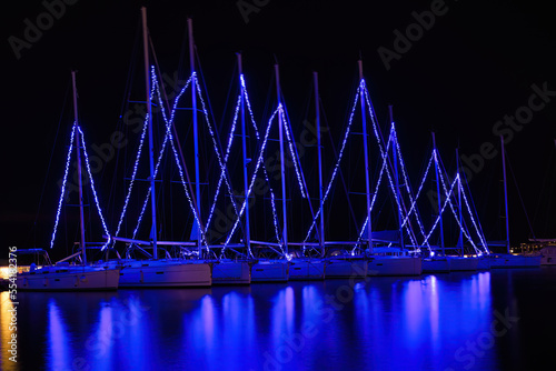 Fototapeta Naklejka Na Ścianę i Meble -  Sailboat Holiday Lights, Christmas Lights, port of the beautiful city of Volos, Greece