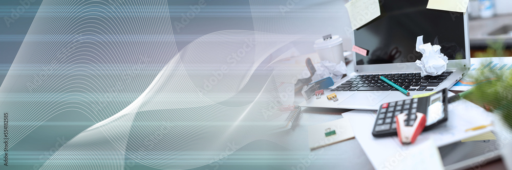 Messy and cluttered desk; panoramic banner Messy and cluttered desk; panoramic banner