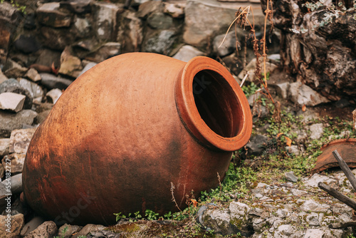 Obraz na płótnie old Abandoned Kvevri on Ground. The Large Earthenware Vessel Used For The Fermentation, Storage And Ageing Of Traditional Georgian Wine. w salonie
