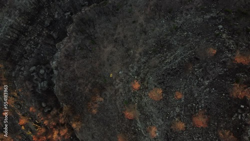 Top down aerial of devasted area after violent wildfire in Pont de Vilomara