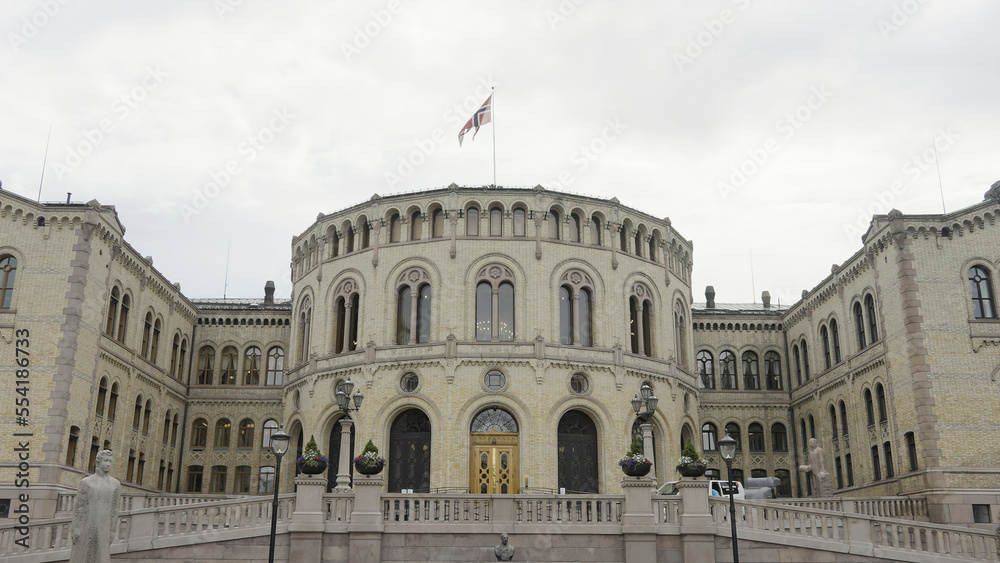 Buildings of the Parliament of Norway. Action.Old white stone building,Storting Monument