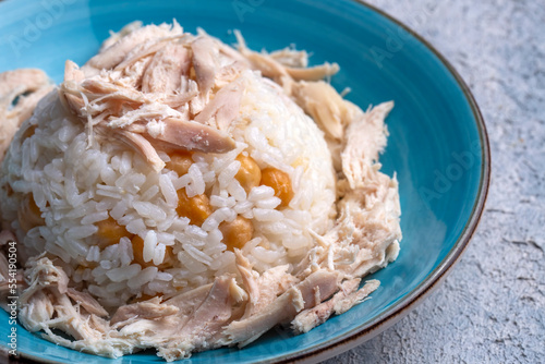Traditional delicious Turkish food; Rice with chickpeas and chicken (Turkish name; Tavuklu nohutlu pilav or pilaf)