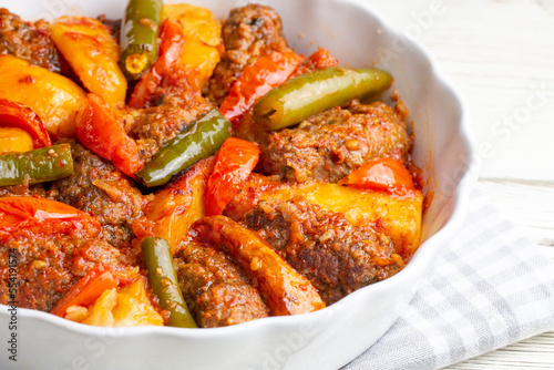 Traditional Homemade Turkish Food Kofte - Kofta with Tomato Sauce and Potatoes. (Turkish name  Izmir kofte) © Esin Deniz