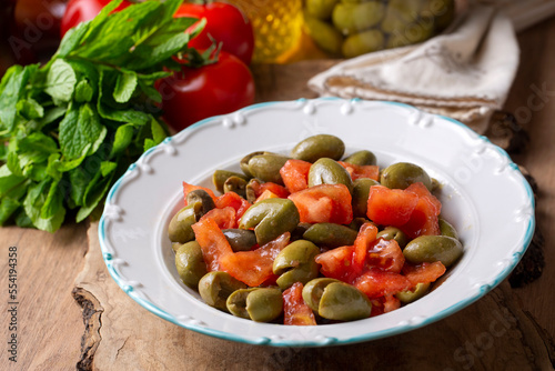Gourmet flavors from traditional Turkish cuisine; green olive salad (Turkish name; Kirma yesil zeytin salatasi) A flavor belonging to the Turkey - Antakya region.