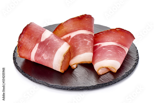 Italian prosciutto crudo or spanish jamon. Jerked meat, isolated on white background. High resolution image
