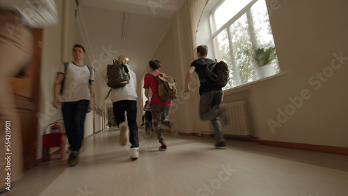 Change at school. Stock footage.Running schoolchildren from a briefcase to a lesson in the classrooms of the school
