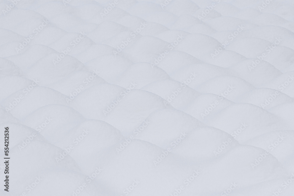 Fototapeta premium snowdrifts in the form of mounds, background, texture image