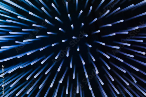 Фотография abstract background of glowing blue sticks, blurred image
