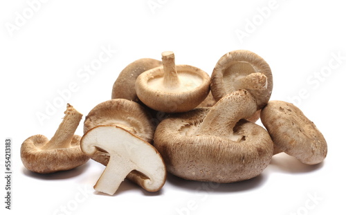 Heap fresh shiitake half mushroom isolated on white