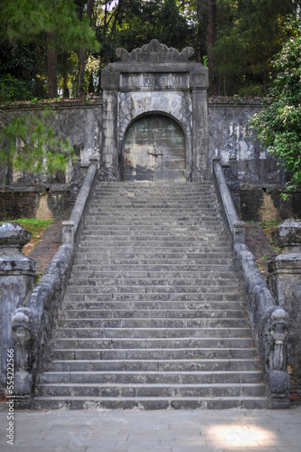 Fototapeta Naklejka Na Ścianę i Meble -  massive entrance through the fortification wall into the gardens of the royal palace in Vietnam