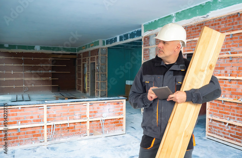 Man builder. Guy inside bui...