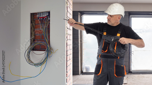 Man electrician. Electricit...