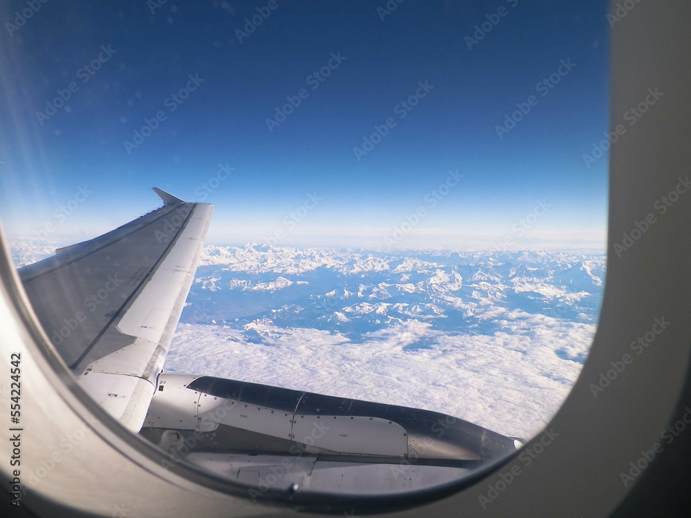 Aircraft wing and Alps from the plane window. Aircraft wing and Alps from the plane window.