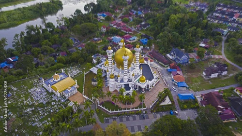 Aerial Sunrise Time lapse of a  mosque  in Kuala Kangsar, Perak, Malaysia at dawn. Prores Full HD Timelapse. photo