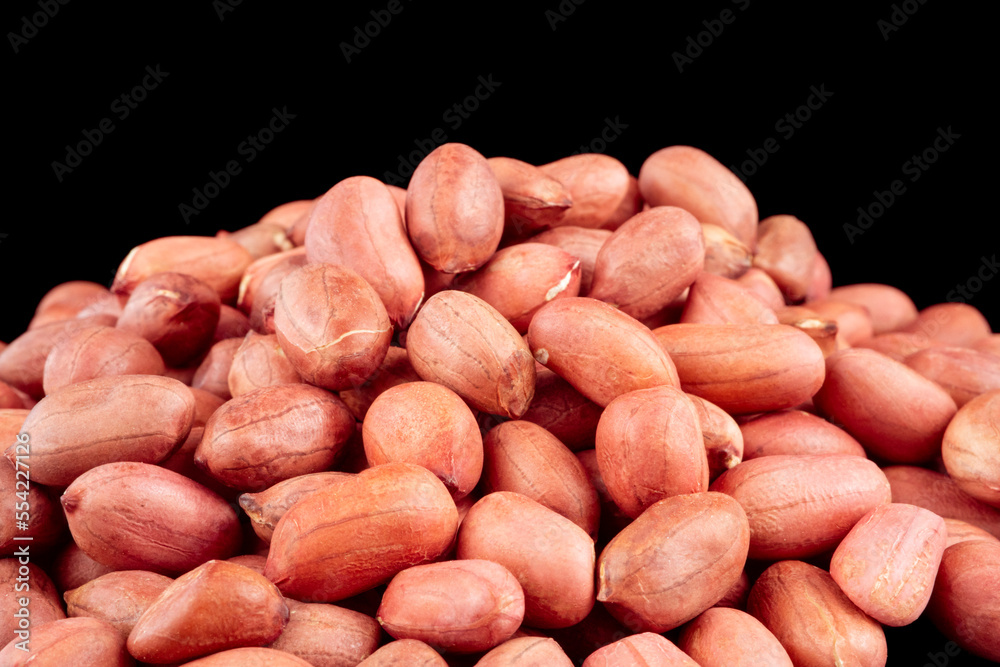 Peanuts isolated on black background. Heap Peanuts Peanuts isolated on black background. Heap Peanuts