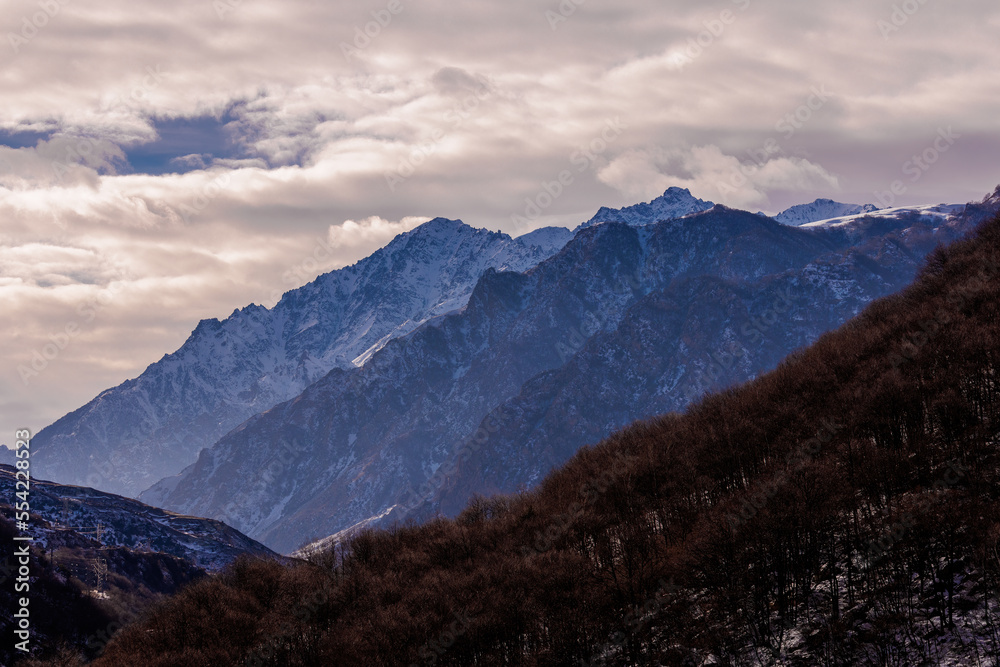 Beautiful  Mountain Landscape. Panoramic view of the snow-covered winter mountains of the Greater North Caucasus. Elbrus, Upper Balkaria, Kabardino-Balkaria, Russia.