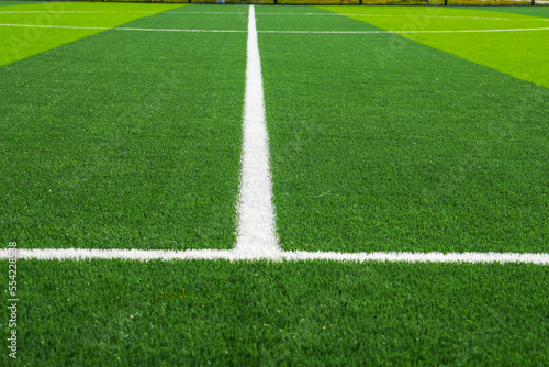 Close-up of the goal and touchline of a brand new football stadium